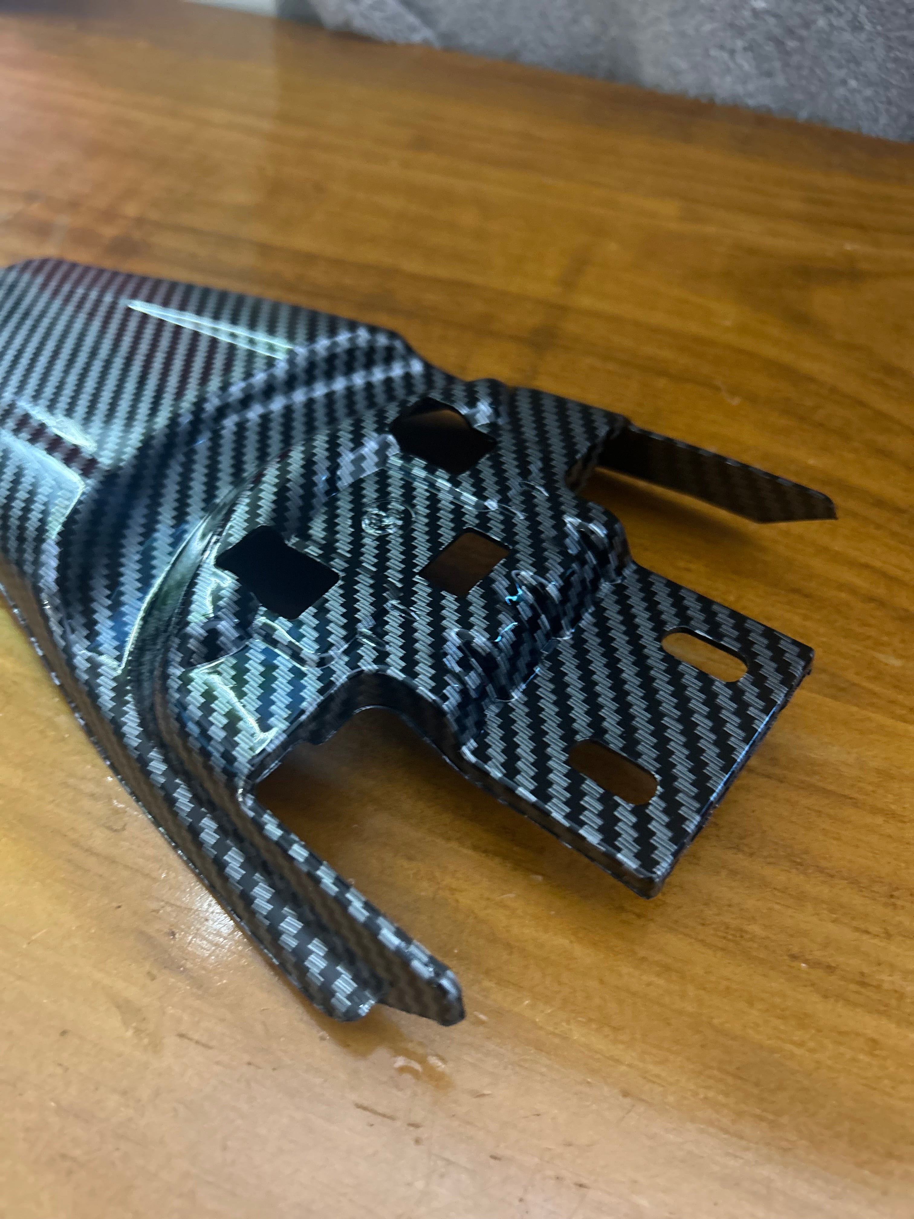 Surron carbon fibre rear seat mudguard