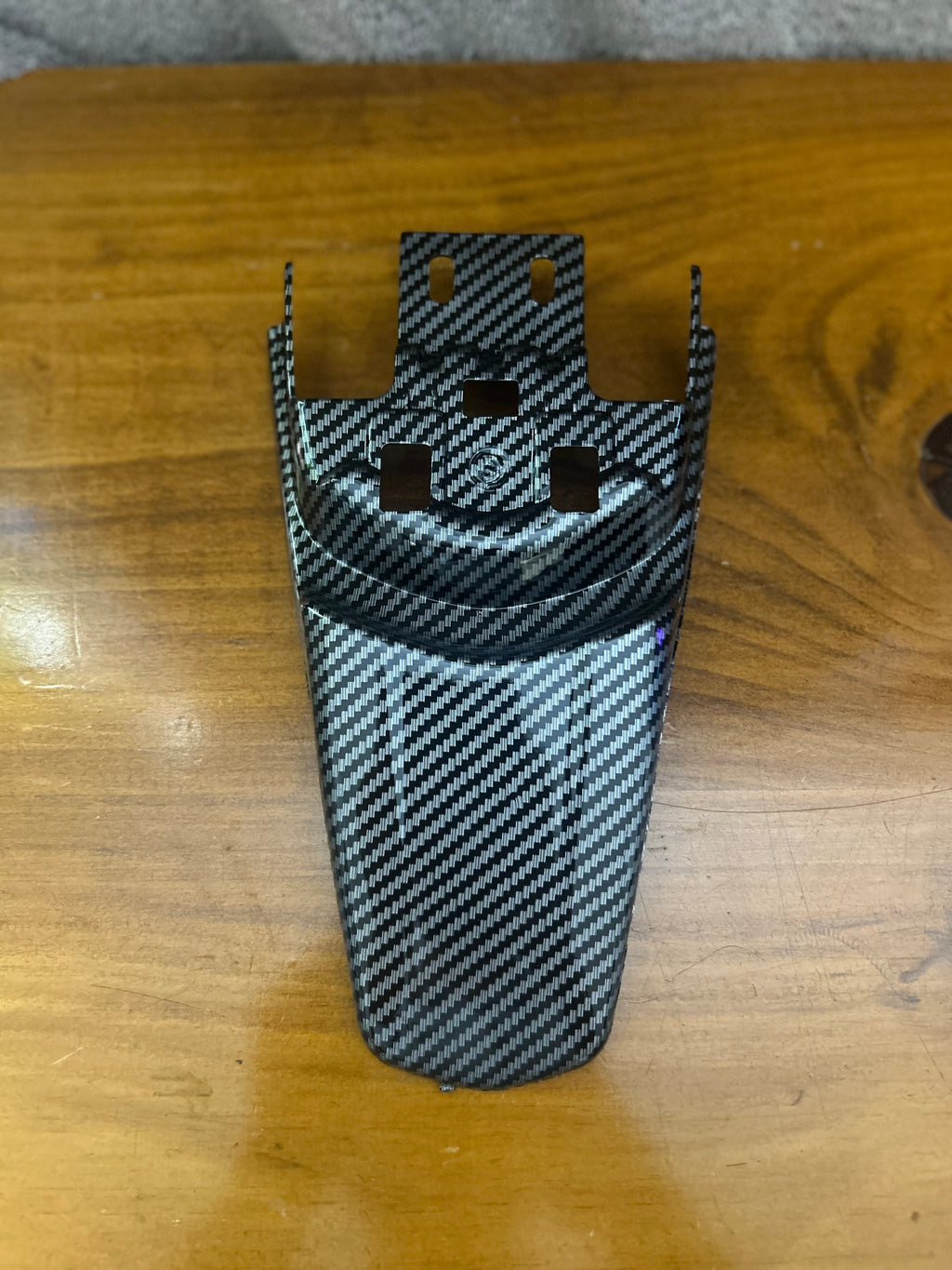 Surron carbon fibre rear seat mudguard