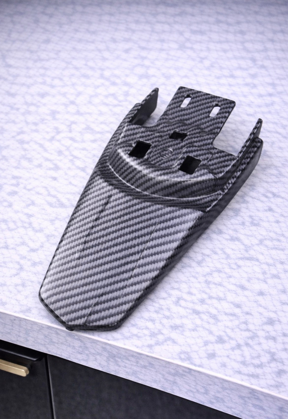 Surron carbon fibre rear seat mudguard